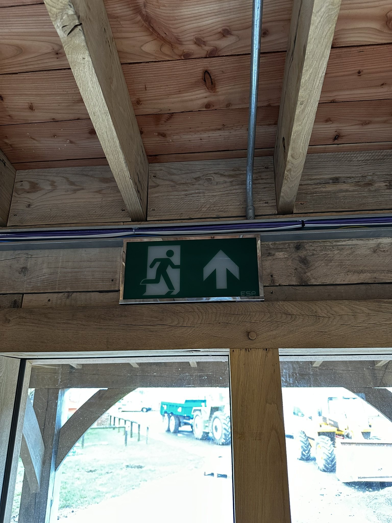 Emergency lighting and exit signage installed at Hangar 50